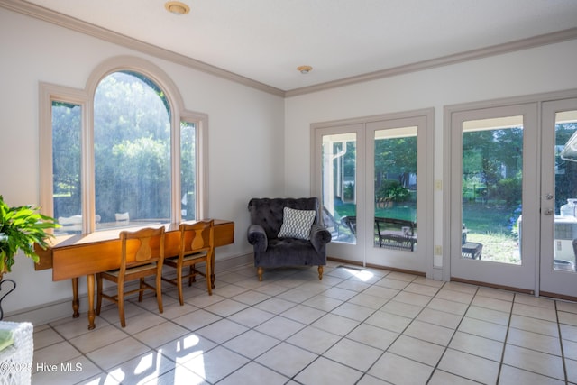 202 Forest Dr, Clinton, NC 28328 - living area with french doors, crown molding, healthy amount of natural light, light tile patterned flooring, and baseboards