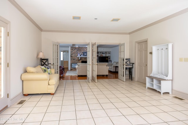 202 Forest Dr, Clinton, NC 28328 - living room featuring ornamental molding, french doors, and baseboards