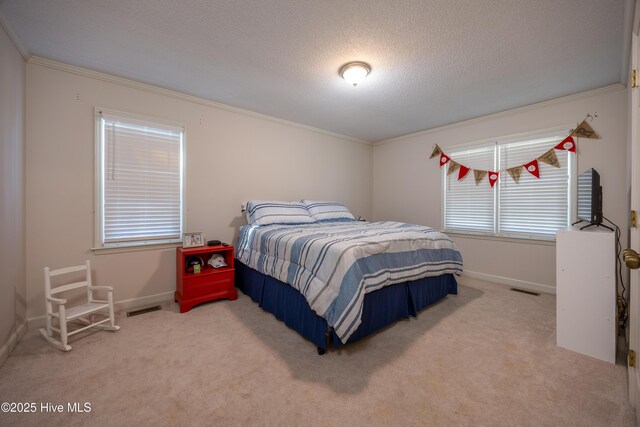 202 Forest Dr, Clinton, NC 28328 - carpeted bedroom with ornamental molding, a textured ceiling, and baseboards