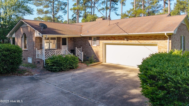 202 Forest Dr, Clinton, NC 28328 - ranch-style home with driveway, brick siding, and a garage