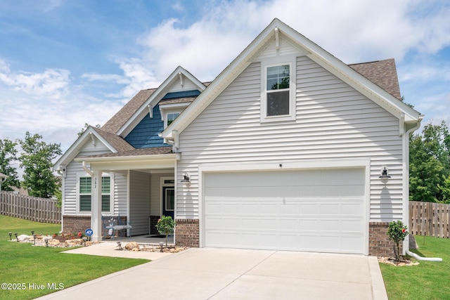 382 Sandy Brook Ct, Supply, NC 28462 - craftsman-style home with brick siding, concrete driveway, and roof with shingles