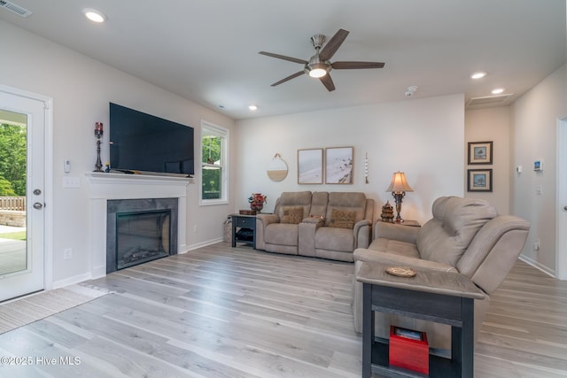 382 Sandy Brook Ct, Supply, NC 28462 - living room with light wood-type flooring, ceiling fan, plenty of natural light, and recessed lighting