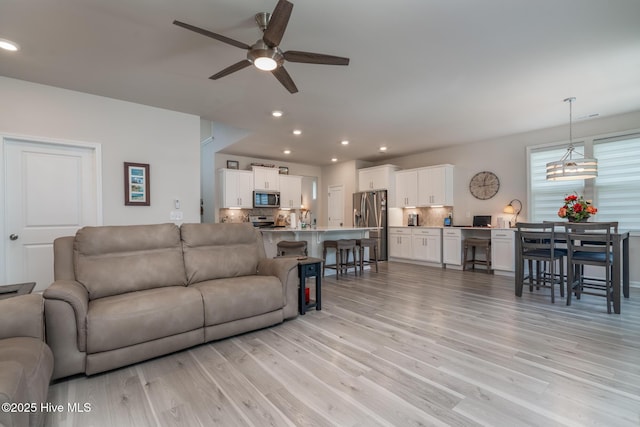 382 Sandy Brook Ct, Supply, NC 28462 - living area with ceiling fan, light wood-type flooring, and recessed lighting