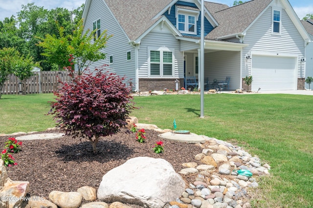 382 Sandy Brook Ct, Supply, NC 28462 - view of front of home with roof with shingles, brick siding, an attached garage, and concrete driveway