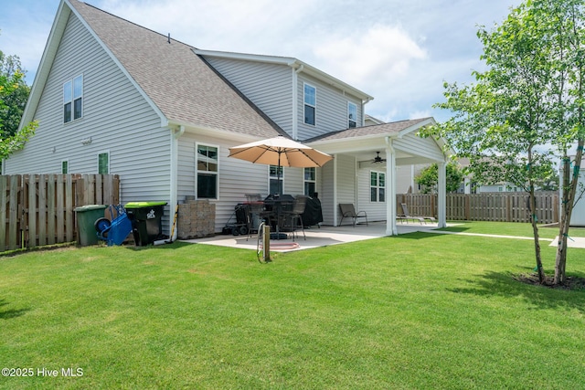 382 Sandy Brook Ct, Supply, NC 28462 - back of house featuring a ceiling fan, a shingled roof, and a patio area