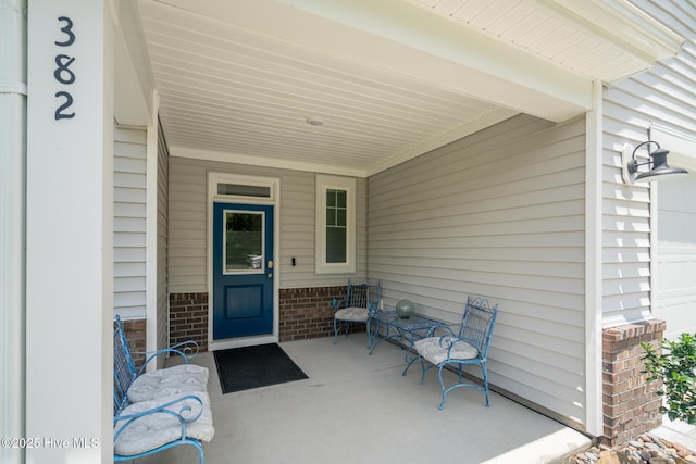 382 Sandy Brook Ct, Supply, NC 28462 - property entrance with brick siding and an attached carport