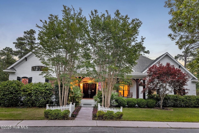 3108 Rivendell Pl, Wilmington, NC 28411 - view of property hidden behind natural elements featuring brick siding