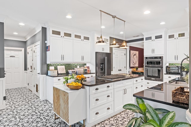 3108 Rivendell Pl, Wilmington, NC 28411 - kitchen with stainless steel appliances, a center island, white cabinetry, backsplash, and recessed lighting