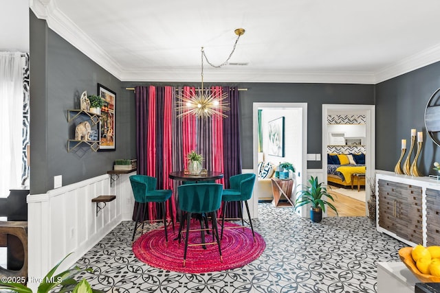 3108 Rivendell Pl, Wilmington, NC 28411 - dining area featuring crown molding, a chandelier, and wainscoting