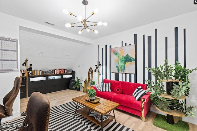 3108 Rivendell Pl, Wilmington, NC 28411 - living room with wood finished floors, a chandelier, and vaulted ceiling