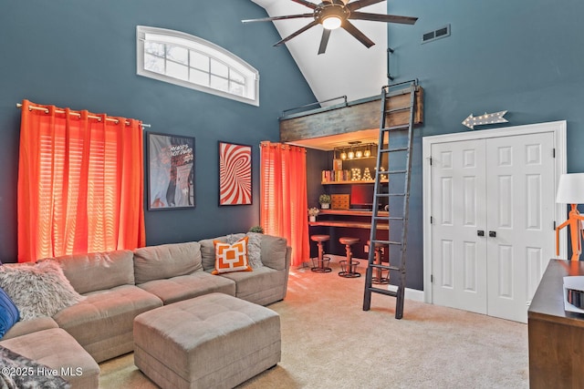 3108 Rivendell Pl, Wilmington, NC 28411 - carpeted living room with high vaulted ceiling, a ceiling fan, and a dry bar