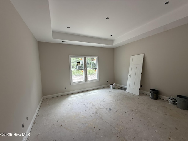520 Harrow Dr, Carthage, NC 28327 - empty room featuring a raised ceiling and baseboards