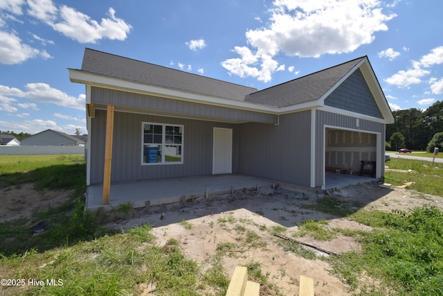 58 Hampton Way, Snow Hill, NC 28580 - view of front of home featuring an attached garage, a porch, and roof with shingles