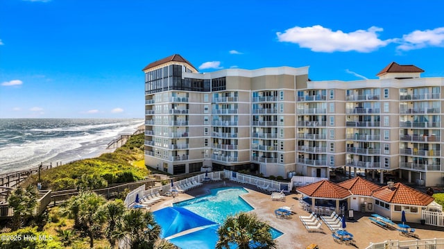 2000 New River Inlet Rd Unit 1208, North Topsail Beach, NC 28460 - community pool featuring a patio area and view of water and beach