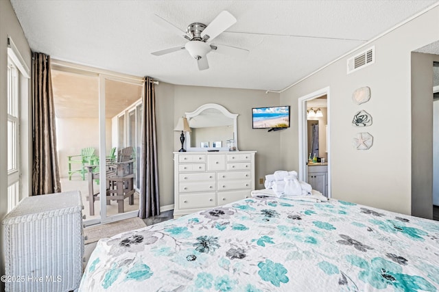 2000 New River Inlet Rd Unit 1208, North Topsail Beach, NC 28460 - bedroom featuring access to outside, a ceiling fan, a textured ceiling, wood finished floors, and connected bathroom