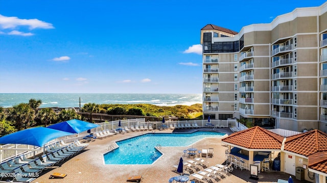 2000 New River Inlet Rd Unit 1208, North Topsail Beach, NC 28460 - community pool with a patio and a water view