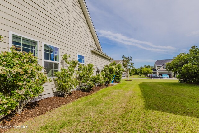 411 Canvasback Ln, Sneads Ferry, NC 28460 - view of green lawn