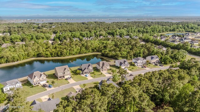 411 Canvasback Ln, Sneads Ferry, NC 28460 - aerial view of property's location featuring a forest, nearby suburban area, and a nearby body of water