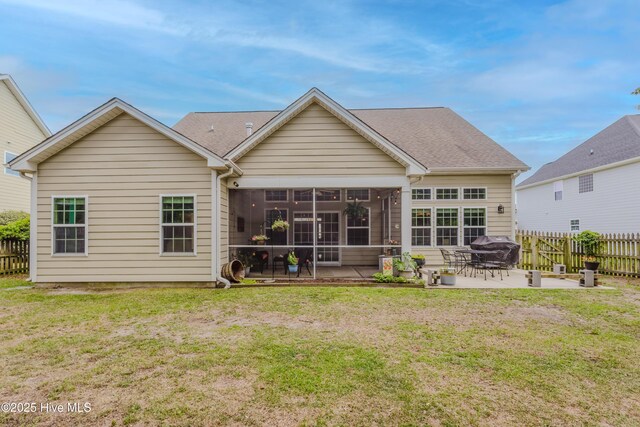 411 Canvasback Ln, Sneads Ferry, NC 28460 - back of property with a patio area and a sunroom