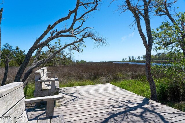 411 Canvasback Ln, Sneads Ferry, NC 28460 - deck featuring a water view