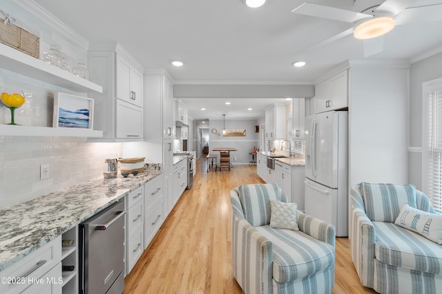 827 Village Point Rd SW, Shallotte, NC 28470 - kitchen with white refrigerator with ice dispenser, open shelves, white cabinetry, backsplash, and crown molding