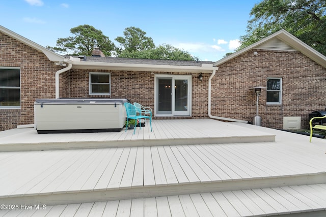 827 Village Point Rd SW, Shallotte, NC 28470 - wooden terrace featuring a hot tub