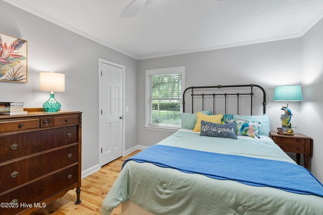827 Village Point Rd SW, Shallotte, NC 28470 - bedroom featuring light wood-style floors, ornamental molding, baseboards, and ceiling fan