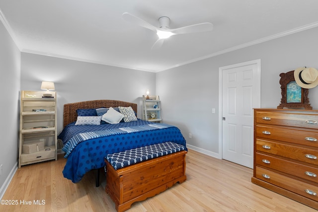 827 Village Point Rd SW, Shallotte, NC 28470 - bedroom with ornamental molding, light wood-style floors, baseboards, and a ceiling fan