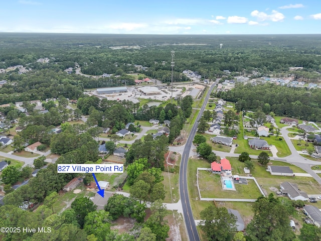 827 Village Point Rd SW, Shallotte, NC 28470 - aerial overview of property's location featuring a heavily wooded area and nearby suburban area