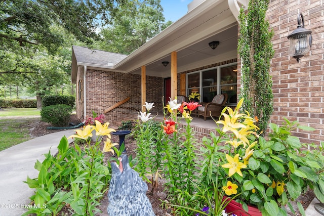 827 Village Point Rd SW, Shallotte, NC 28470 - property entrance with brick siding and covered porch