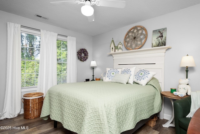 229 Trappers Trl, New Bern, NC 28560 - bedroom with wood finished floors, ceiling fan, and a textured ceiling