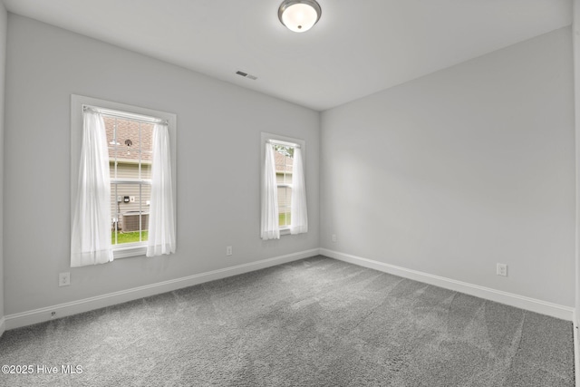 1005 Flounder Run, New Bern, NC 28562 - carpeted empty room featuring baseboards and healthy amount of natural light