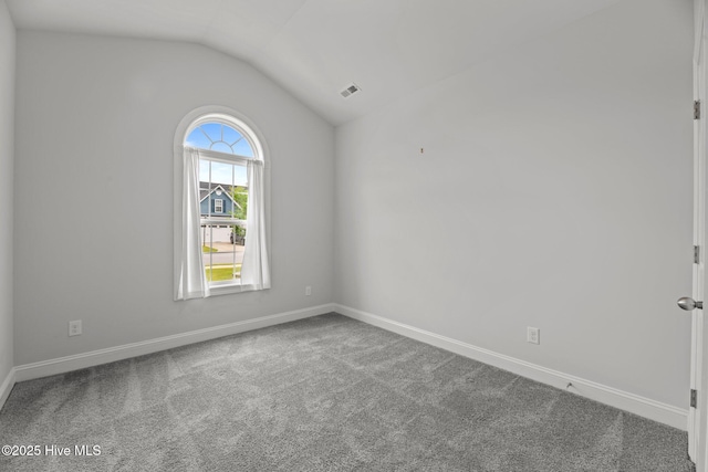1005 Flounder Run, New Bern, NC 28562 - carpeted spare room with vaulted ceiling and baseboards