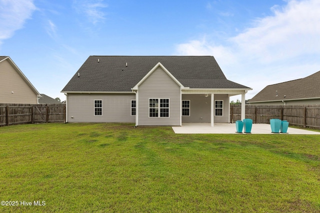 1005 Flounder Run, New Bern, NC 28562 - back of property with a patio and a shingled roof