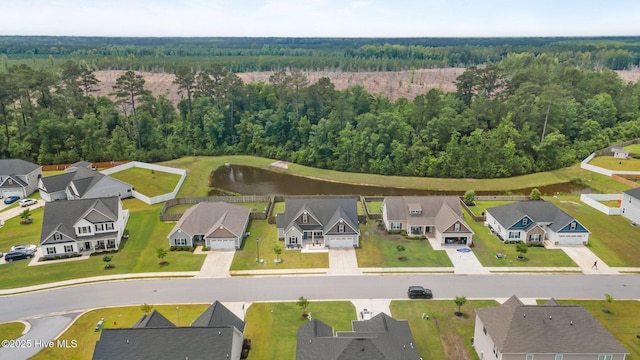 1005 Flounder Run, New Bern, NC 28562 - aerial view of residential area with a heavily wooded area and a nearby body of water