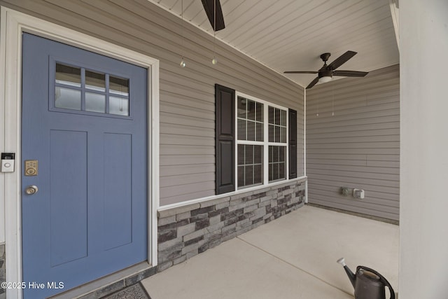 1005 Flounder Run, New Bern, NC 28562 - entrance to property featuring ceiling fan, stone siding, and a porch