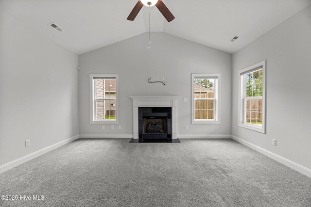 1005 Flounder Run, New Bern, NC 28562 - unfurnished living room featuring a ceiling fan, carpet floors, a fireplace with flush hearth, baseboards, and lofted ceiling