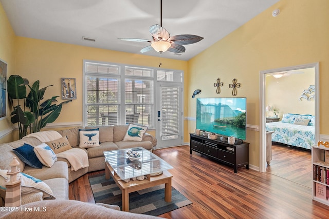 4256 Anderson Dr SE, Southport, NC 28461 - living area with a ceiling fan, wood finished floors, and baseboards