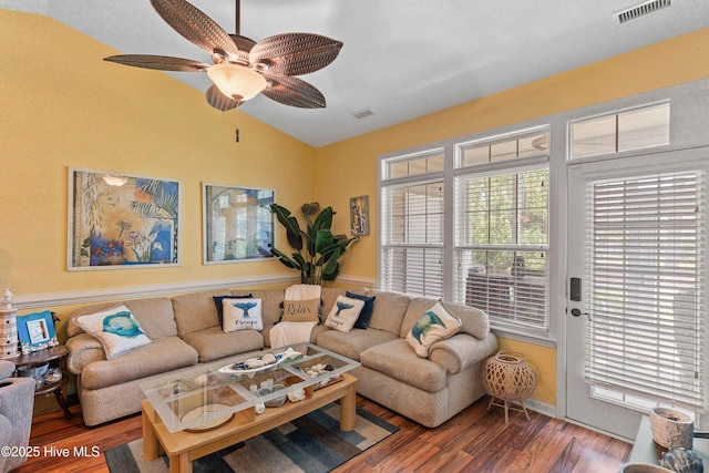 4256 Anderson Dr SE, Southport, NC 28461 - living area with lofted ceiling, wood finished floors, and ceiling fan
