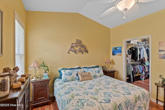 4256 Anderson Dr SE, Southport, NC 28461 - bedroom with vaulted ceiling, wood finished floors, a spacious closet, a closet, and a ceiling fan