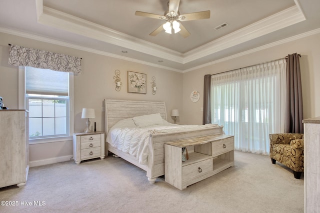 9116 Oak Ridge Plantation Dr, Calabash, NC 28467 - carpeted bedroom featuring a tray ceiling, crown molding, and a ceiling fan