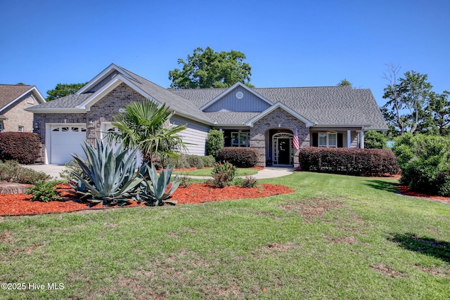 9116 Oak Ridge Plantation Dr, Calabash, NC 28467 - view of front of house featuring an attached garage, a front yard, brick siding, and roof with shingles
