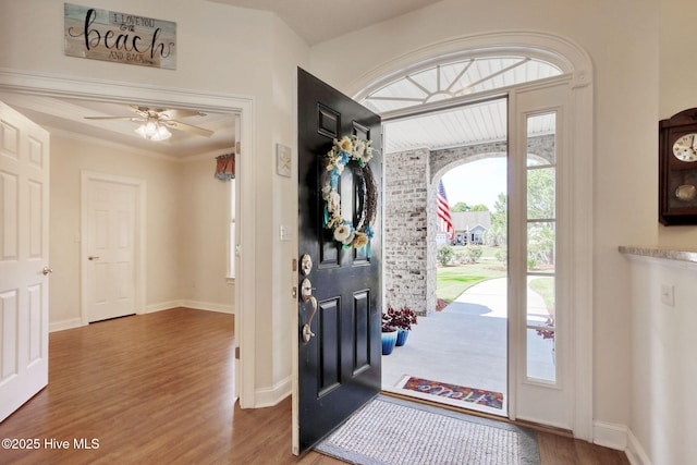 9116 Oak Ridge Plantation Dr, Calabash, NC 28467 - foyer entrance featuring wood finished floors and a ceiling fan