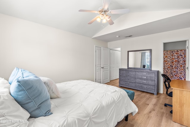 2635 Asher View Ct, Raleigh, NC 27606 - bedroom with lofted ceiling, light wood-style floors, ceiling fan, and a closet