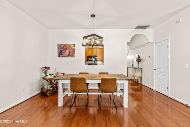 2635 Asher View Ct, Raleigh, NC 27606 - dining area with wood finished floors and baseboards