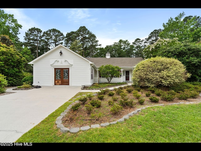 71 Combine Ln SE, Leland, NC 28451 - view of front of house with french doors