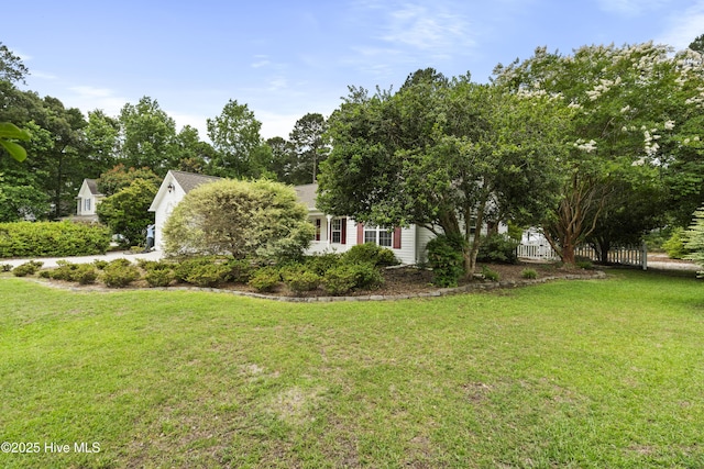 71 Combine Ln SE, Leland, NC 28451 - view of front of house featuring a front lawn