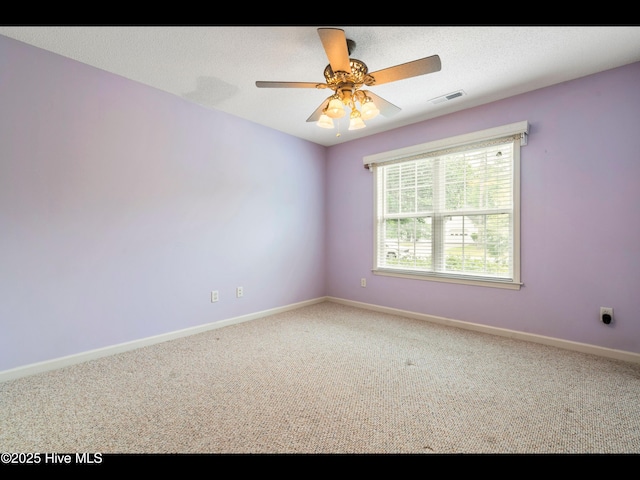 71 Combine Ln SE, Leland, NC 28451 - empty room with carpet floors, baseboards, and ceiling fan