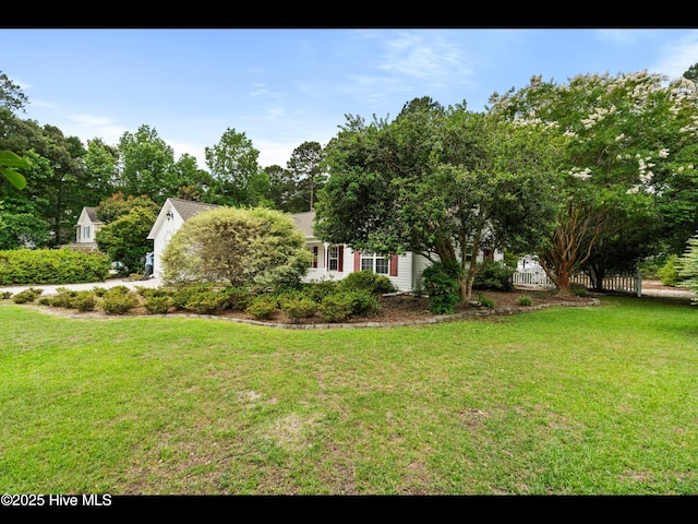 71 Combine Ln SE, Leland, NC 28451 - view of front facade featuring a front lawn