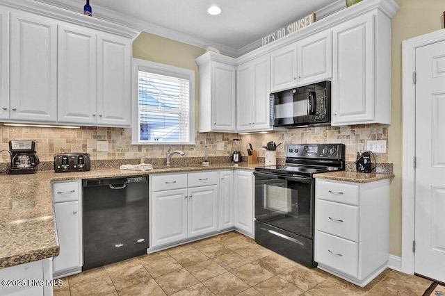 421 30th St, Sunset Beach, NC 28468 - kitchen with black appliances, white cabinetry, a sink, and ornamental molding